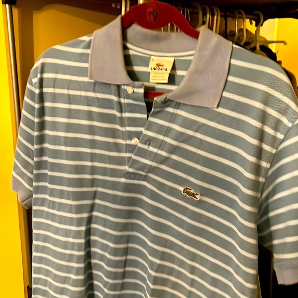 Blue striped Lacoste polo style shirt